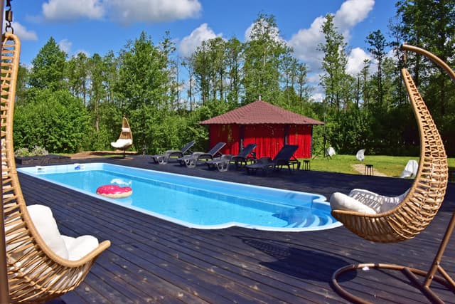 Dubingių Vila įsikūrusi Molėtų rajone, Asvejos regioniniame parke, Žvernos hidrografiniame draustiny