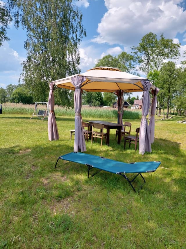 Poilsis Molėtų raj prie ilgio ežero 